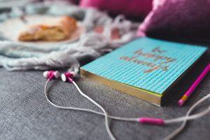 book and headphones